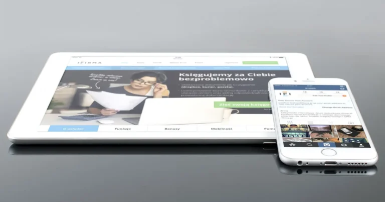choosing-digital-marketing-strategy-small-business-ireland Modern tablet and smartphone displaying web content on a reflective surface, highlighting technology and connectivity